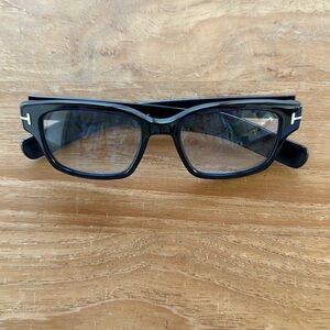 Tom Ford eyeglasses , dark navy blue frames.